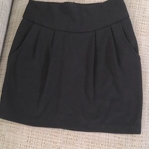 Grass black pleated short skirt Size one